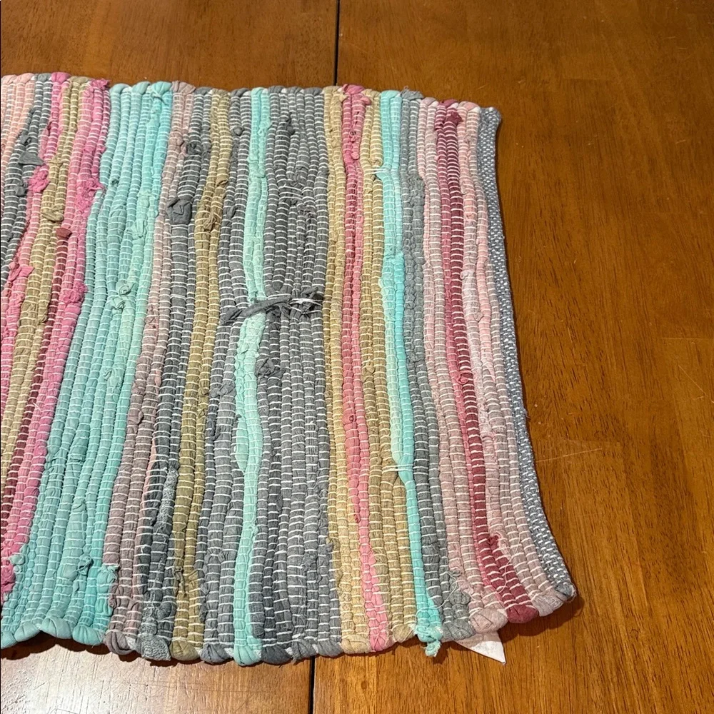 Woven multicolored rag rug.